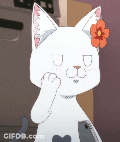 A White Cat With A Flower In Its Ear Is Holding A Phone GIF