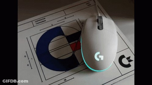A White Computer Mouse Is Sitting On Top Of A Piece Of Paper That Says Construction Commissioners GIF