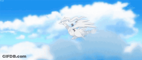 A White Dragon Is Flying Through The Clouds In A Blue Sky GIF
