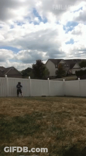 A White Fence Surrounds A Grassy Yard With A House In The Background And The Word Failland At The Bottom GIF