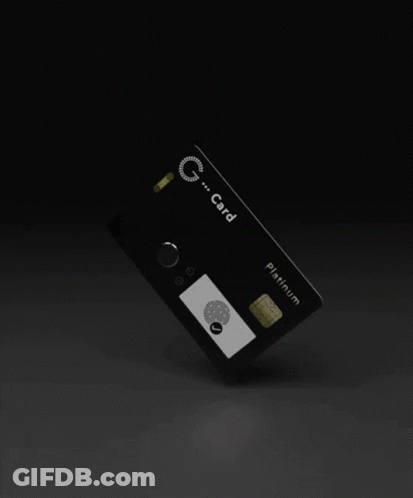 A White G Card Platinum Card Is Laying On Its Side GIF