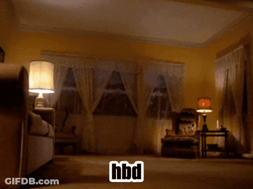 A White Horse Is Standing In A Living Room With A Hbd Sticker GIF