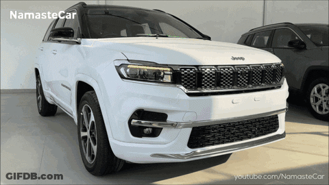 A White Jeep Is Parked In Front Of A Youtube Channel GIF