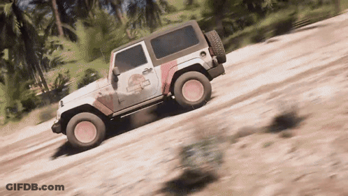 A White Jeep With A Jurassic Park Logo On The Side GIF