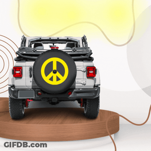 A White Jeep With A Yellow Peace Sign On Its Spare Tire GIF
