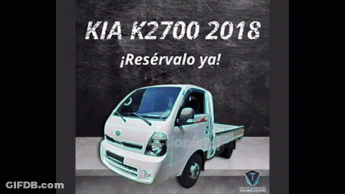 A White Kia K2700 Truck Is Sitting On A Concrete Surface GIF