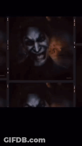 A White Light Is Coming Out Of The Middle Of A Black Background GIF