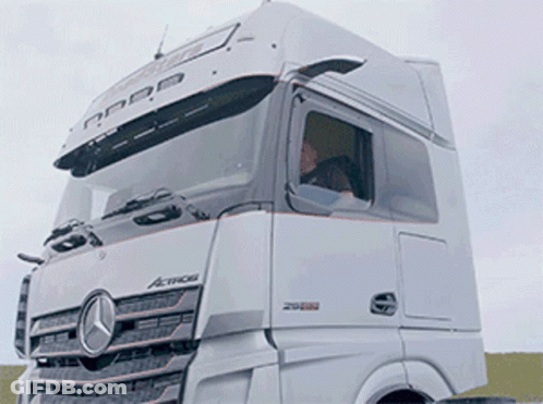 A White Mercedes Truck With The Word Actros On The Side GIF