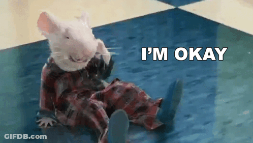 A White Mouse Is Sitting On A Checkered Floor With The Words I 'M Okay Above It GIF