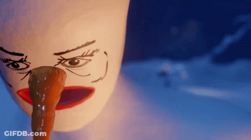 A White Mug With A Face Drawn On It And A Long Tongue GIF