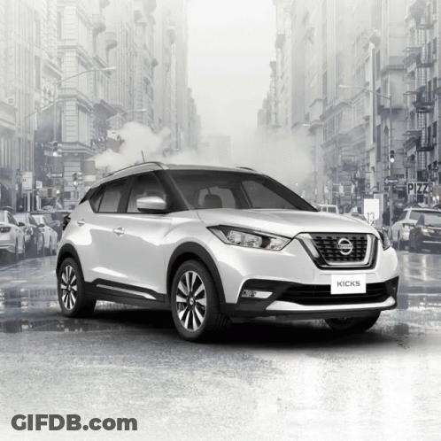 A White Nissan Kicks Is Parked In A City GIF