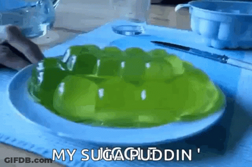 A White Plate Topped With Green Pudding With The Words My Sugar Pudding Written On It GIF
