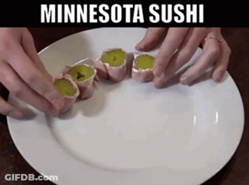A White Plate With A Few Rolls On It And The Words Minnesota Sushi On The Bottom GIF