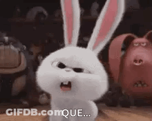 A White Rabbit From The Secret Life Of Pets Is Standing On A Wooden Floor With Its Mouth Open . GIF
