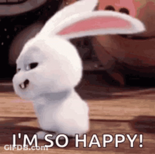 A White Rabbit With Pink Ears Is Standing On A Wooden Floor And Saying `` I 'M So Happy ! '' GIF