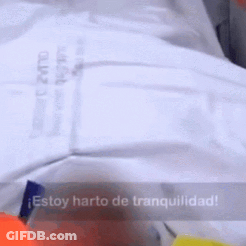 A White Shirt With The Words Estoy Harto De Tranquilidad GIF