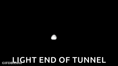 A White Silhouette Of A Tunnel With The Words `` Light End Of Tunnel '' Written Below It . GIF