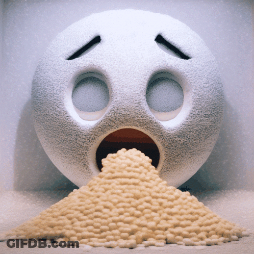 A White Smiley Face With Its Mouth Open And A Pile Of Beans Coming Out Of It GIF
