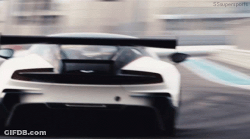 A White Sports Car Is Driving Down A Track With The Words Sssupersports Visible In The Corner GIF
