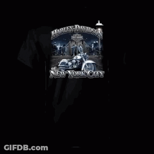 A White T-Shirt With A Harley Davidson Police Badge On It . GIF