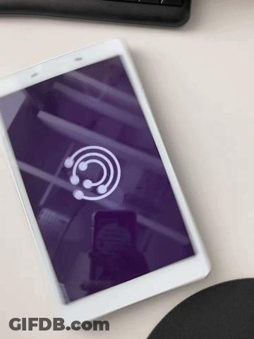 A White Tablet With A Purple Screen And A White Circle On The Screen GIF