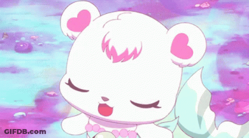 A White Teddy Bear With Pink Ears And A Pearl Necklace GIF