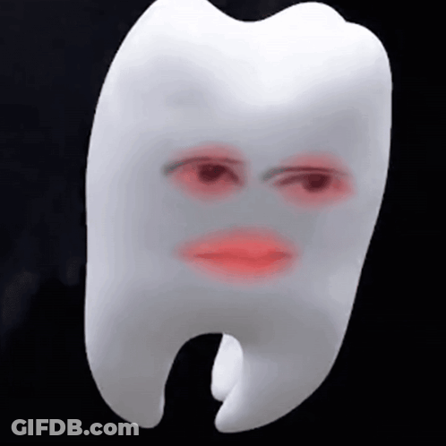 A White Tooth With A Red Face On It GIF