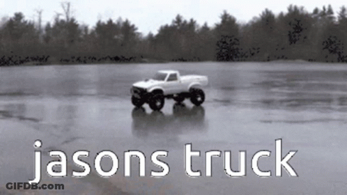 A White Truck Is Driving On A Frozen Lake With The Words Jasons Truck Written Below It GIF