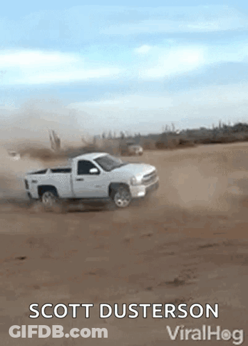 A White Truck Is Driving Through A Dirt Field With The Words Scott Dusterson Viralhog Below It GIF