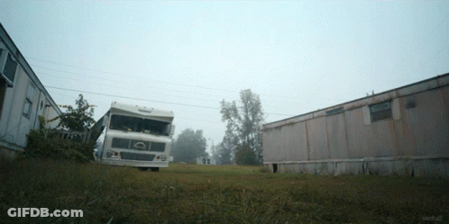 A White Truck Is Parked In A Grassy Field Next To A Trailer That Says Techstuff GIF