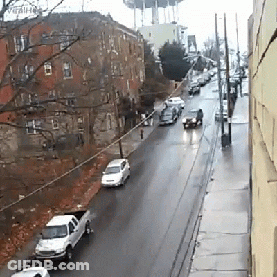 A White Truck Is Parked On The Side Of A Road GIF
