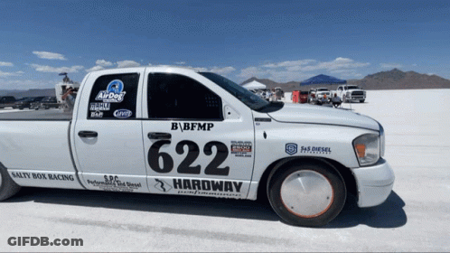A White Truck With The Number 624 On The Side Of It GIF