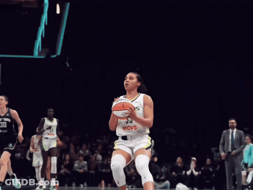 A Wilson Basketball Flies Through The Air GIF