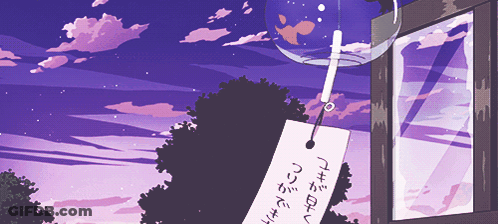 A Wind Chime With A Tag That Says " I Love You " Hangs From A Window GIF