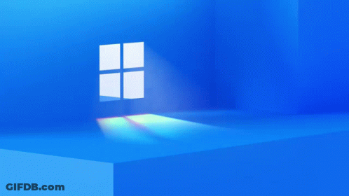 A Window In A Blue Room With A Light Shining Through It GIF