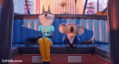 A Wolf And A Koala Are Sitting Next To Each Other In A Car GIF