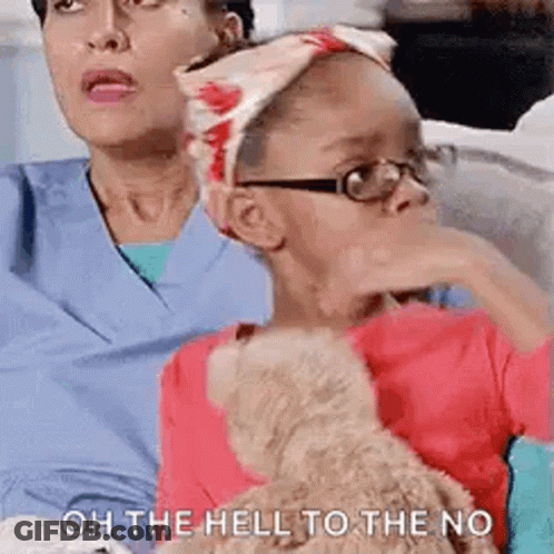 A Woman And A Little Girl Are Sitting On A Couch Holding A Teddy Bear And Talking . GIF