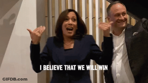 A Woman And A Man Are Celebrating And The Woman Is Saying I Believe That We Will Win GIF