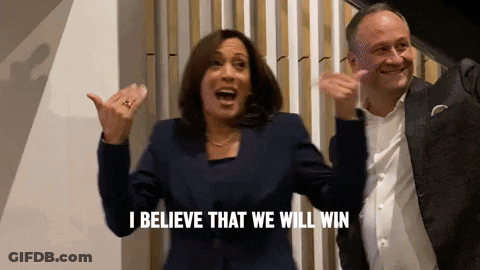 A Woman And A Man Are Celebrating And The Woman Is Saying I Believe That We Will Win GIF
