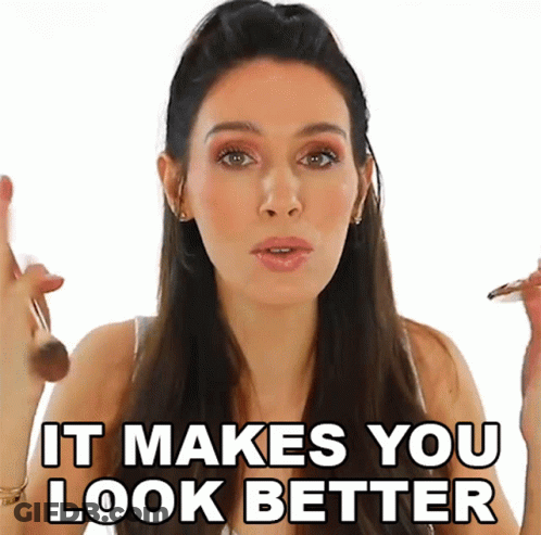 A Woman Applying Makeup With The Words It Makes You Look Better GIF