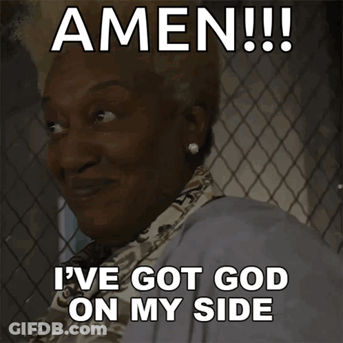A Woman Behind A Chain Link Fence Says Amen I Ve Got God On My Side GIF