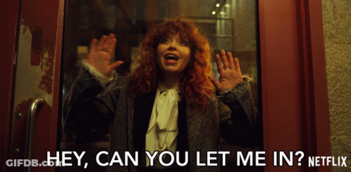 A Woman Behind A Glass Door With The Words Hey Can You Let Me In GIF