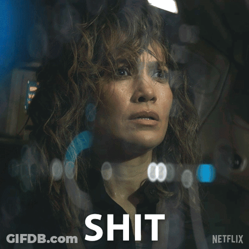 Woman Behind Glass With Shit Written Below GIF