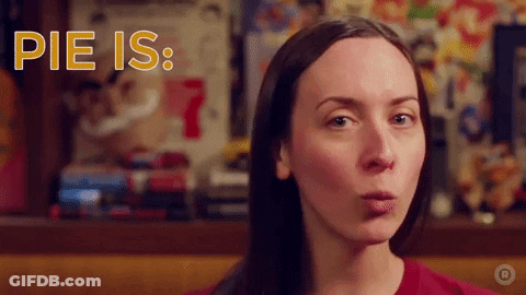 A Woman Blowing A Kiss With The Words Pie Is Written Above Her GIF
