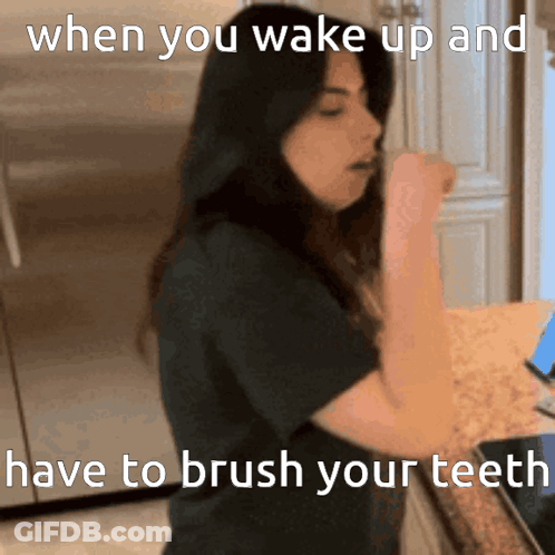 A Woman Brushes Her Teeth In A Meme GIF