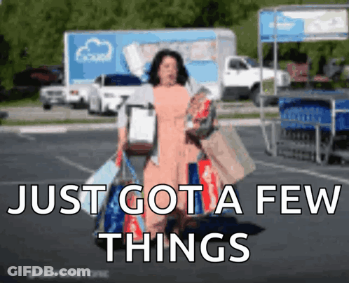 A Woman Carrying Shopping Bags In A Parking Lot With The Words Just Got A Few Things Above Her GIF