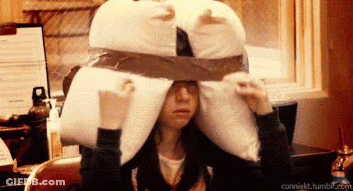 A Woman Covering Her Ears With A Pillow And The Url Conniekt.tumblr.com GIF