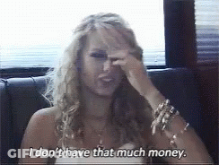 A Woman Covering Her Face With Her Hand And Says I Don 'T Have That Much Money GIF