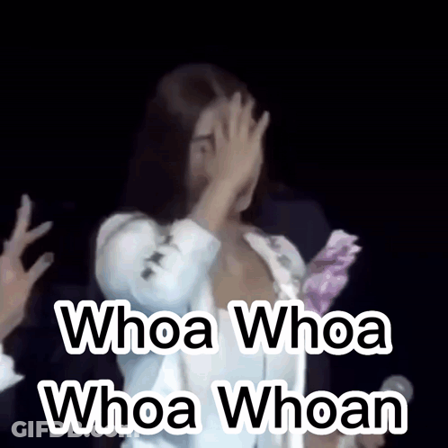 A Woman Covering Her Face With Her Hand And The Words Whoa Whoa Whoa Whoan Written Below Her GIF