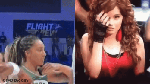 A Woman Covering Her Face With Her Hand In Front Of A Flight Crew Sign GIF